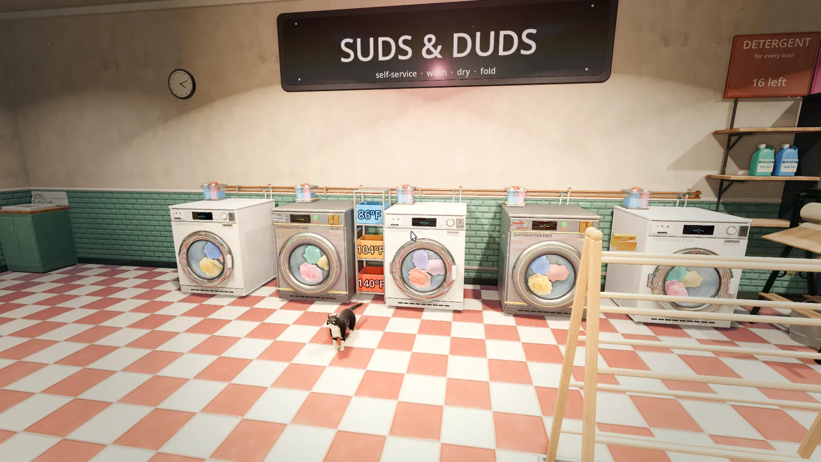 Pocket Change screenshot: a row of washing machines under the Suds and Duds sign, with Bandit the cat walking past